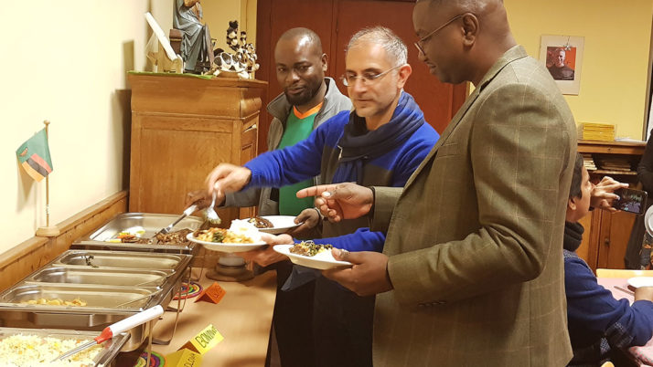 Catholic priests enjoy Zambian delicacie